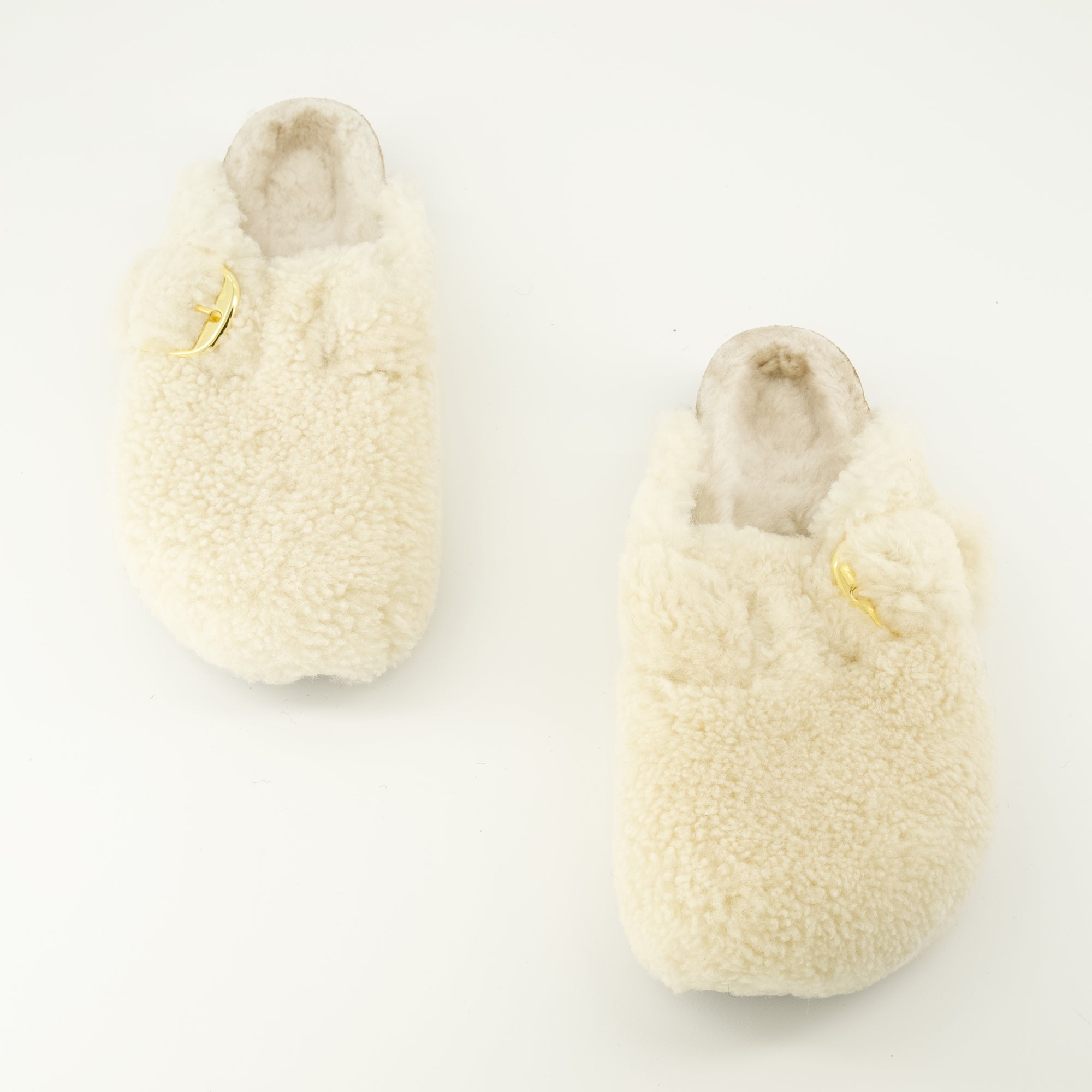 Mules Boston en teddy blanche